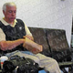Illustration for article titled TMZ's Photo Of "Jerry Sandusky" Eating Donuts At The Airport Was Just Of Some Old Guy Eating Donuts At The Airport